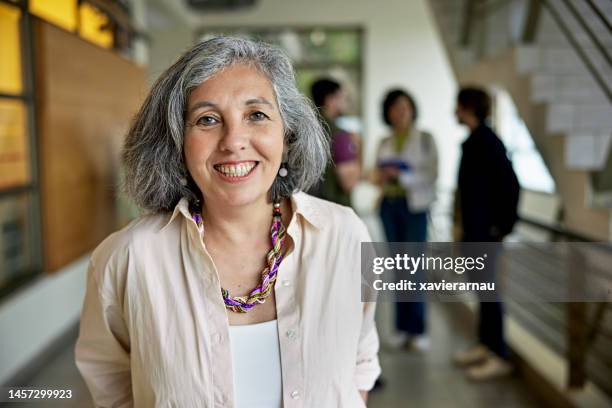 portrait of cheerful university professor - female professor stock pictures, royalty-free photos & images