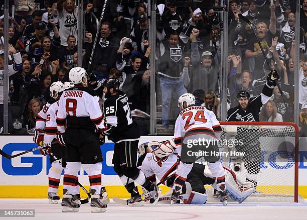 Mike Richards and Dustin Penner of the Los Angeles Kings react after a goal by teammate Jeff Carter in Game Three of the 2012 Stanley Cup Final...