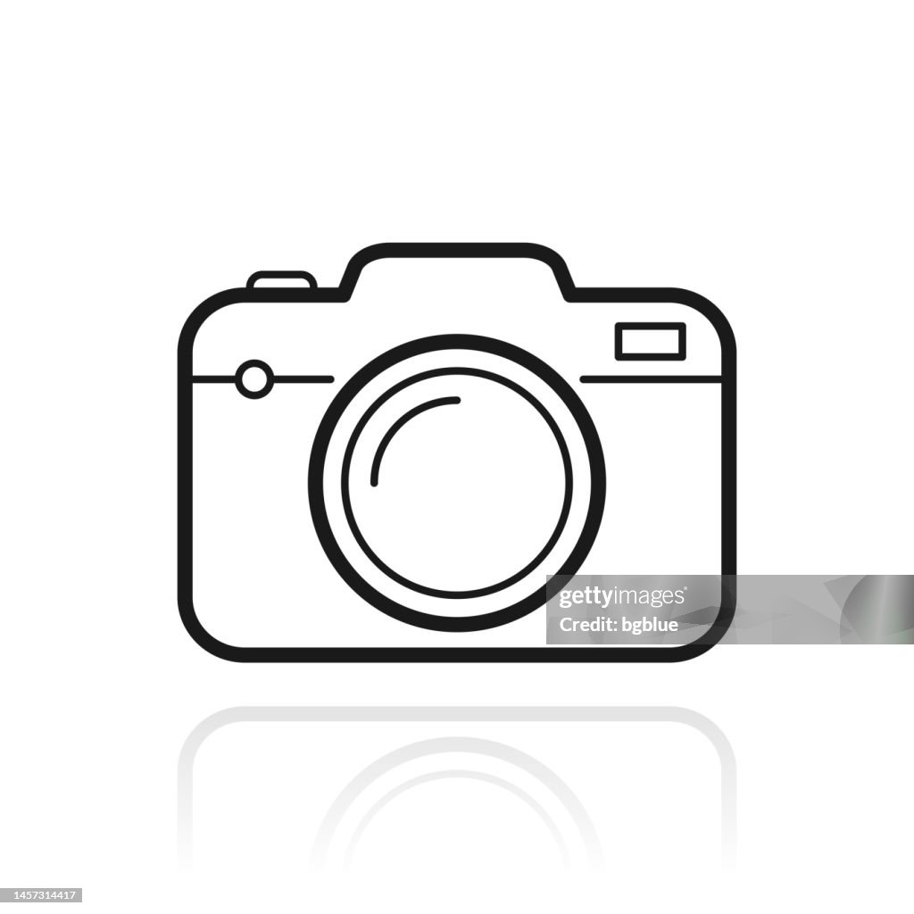 Camera. Icon with reflection on white background