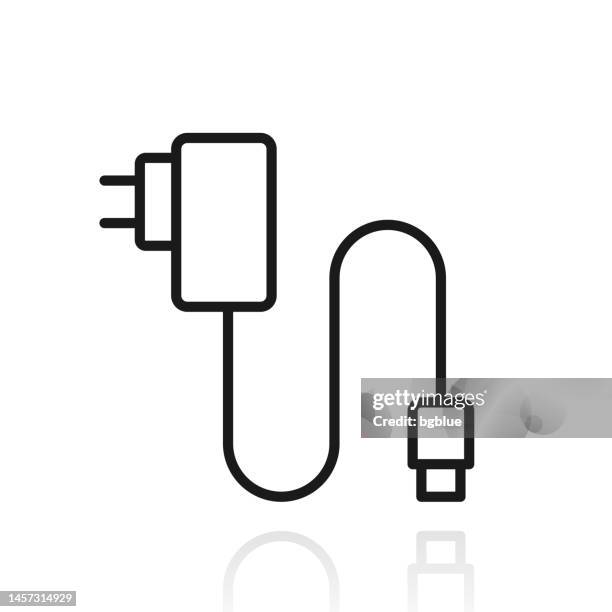 handy-ladegerät. symbol mit reflexion auf weißem hintergrund - plug adapter stock-grafiken, -clipart, -cartoons und -symbole