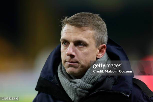 Television pundit Stephen Warnock looks on during the Emirates FA Cup Third Round Replay between Wolverhampton Wanderers and Liverpool at Molineux on...