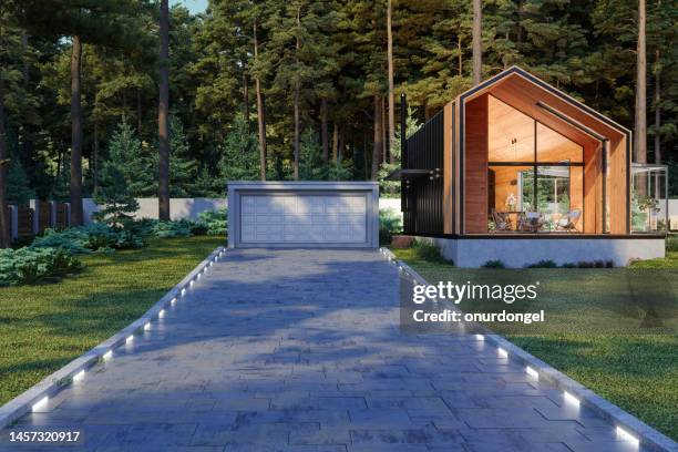 exterior of wooden tiny house with garage - modern garage stock pictures, royalty-free photos & images