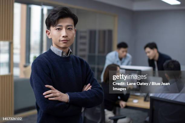 Portrait Of Chinese It Worker In Office High-Res Stock Photo - Getty Images