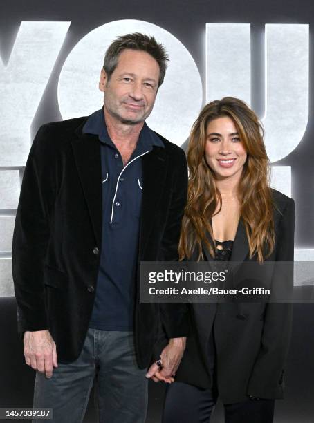 David Duchovny and Monique Pendleberry attend the Los Angeles Premiere of Netflix's "You People" at Regency Village Theatre on January 17, 2023 in...