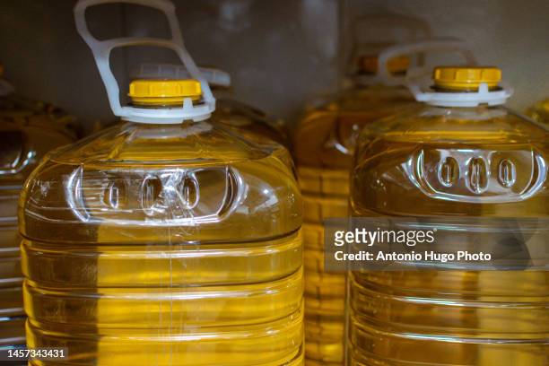 sunflower oil carafes in a kitchen pantry - oil abundance stock pictures, royalty-free photos & images