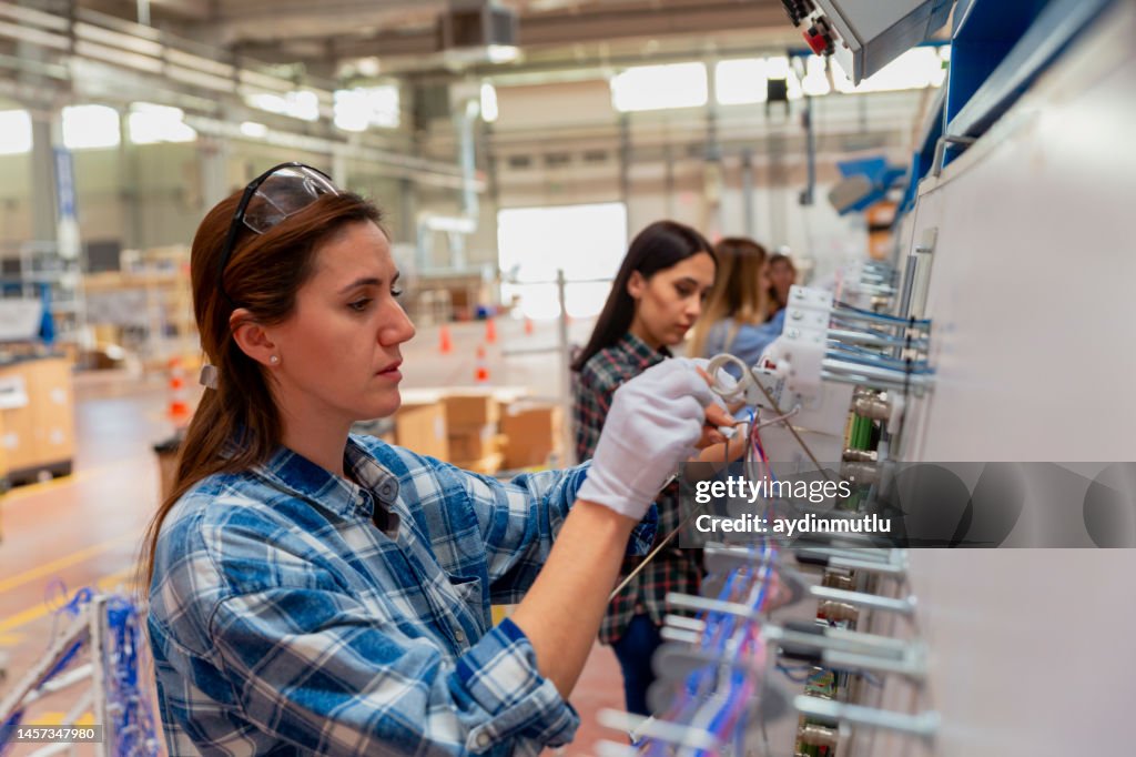 Worker In Production Female Manuel Workers Team Working On The Production Line In Factory ...