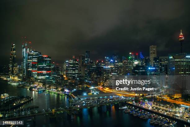 elevated view over darling harbour and sydney cbd at night - barangaroo stock pictures, royalty-free photos & images