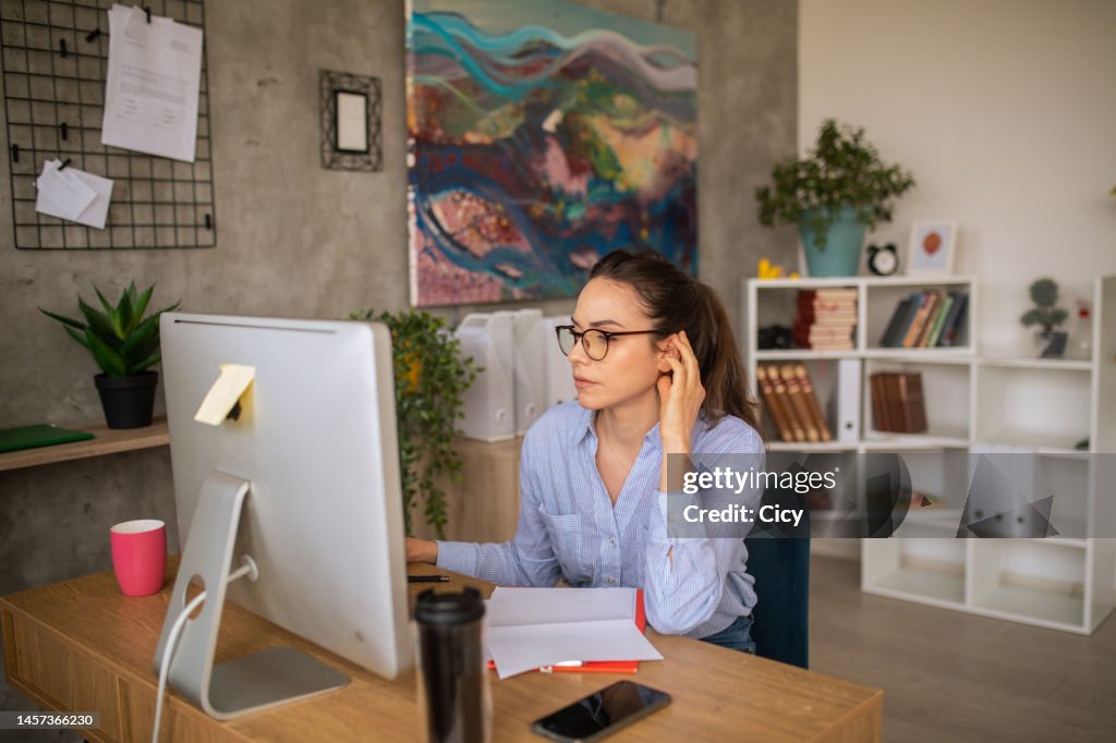 Woman Working On A Desktop Pc At Home High-Res Stock Photo - Getty Images