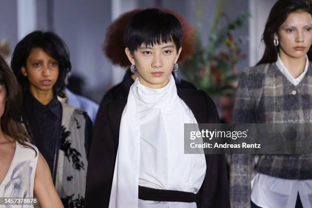 Models pose at the Fassbender x NEWEST runway show during the Berlin Fashion Week AW23 at Kant-Garagen on January 18, 2023 in Berlin, Germany.