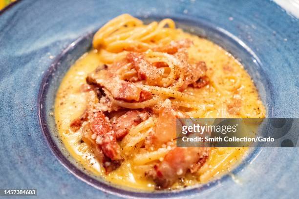 Close-up of a plate of linguine carbonara pasta at Locanda Positano restaurant, an Italian cuisine restaurant in Lafayette, California, December 22,...