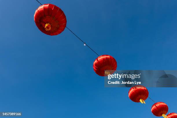 low angle view of red lantern against sky - malaysia architecture stock pictures, royalty-free photos & images