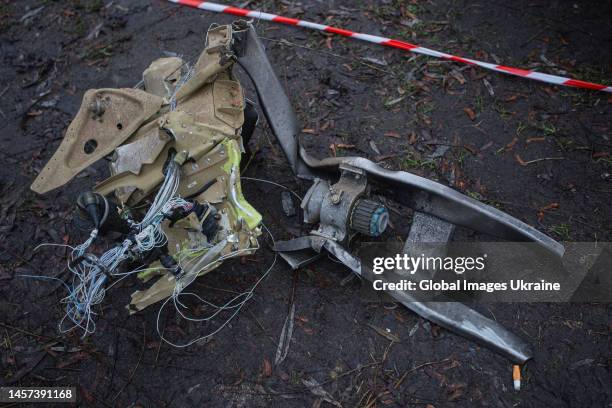 Details of crashed helicopter lie on the ground at the site of a helicopter crash on January 18, 2023 in Brovary, Ukraine. Fourteen people have been...