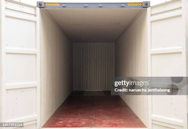 interior of inside an empty shipping cargo container. warehouse logistics and freight transportation - open container truck stock pictures, royalty-free photos & images