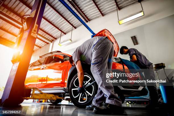 car maintainance - auto repair shop foto e immagini stock