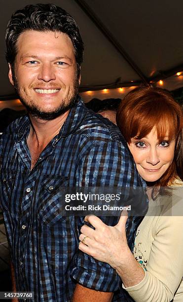 Singers and Songwriters Blake Shelton and Reba Mcentire attend a Barn Party Bonfire Celebration of two's "OVER YOU" & "DRINK ON IT" hosted by Miranda...