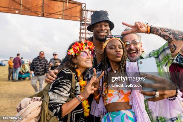 festival group photo with friends - england tattoo stock pictures, royalty-free photos & images
