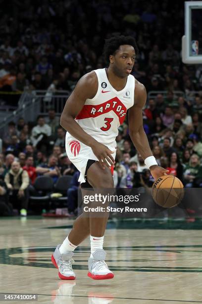 Anunoby of the Toronto Raptors handles the ball during a game against the Milwaukee Bucks at Fiserv Forum on January 17, 2023 in Milwaukee,...