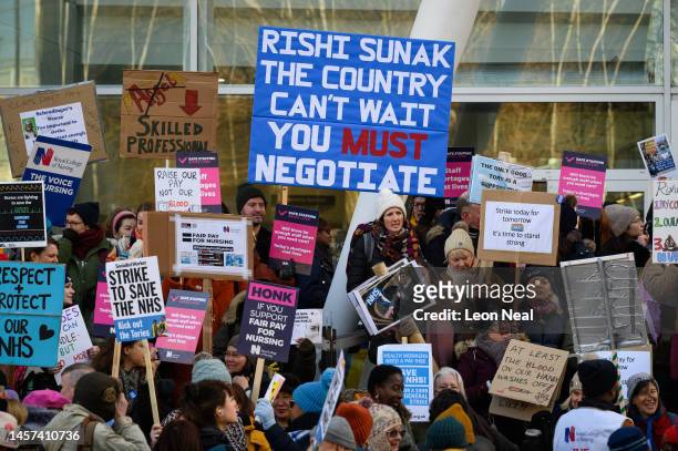 Nursing staff and supporters protest outside University College Hospital during a day of strikes, on January 18, 2023 in London, England. Members of...