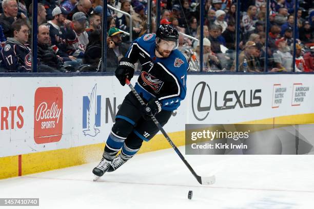 Sean Kuraly of the Columbus Blue Jackets controls the puck during the game against the New York Rangers at Nationwide Arena on January 16, 2023 in...