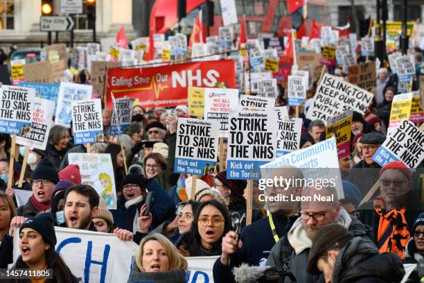Nursing staff and supporters march from University College Hospital to Downing Street during a day of strikes, on January 18, 2023 in London,...