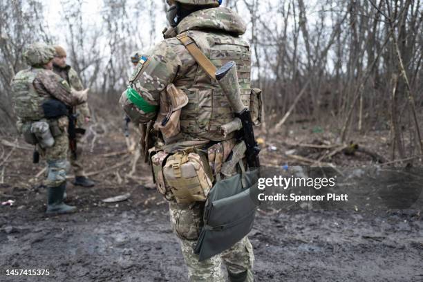 Ukrainian soldiers shelter in the woods along a road outside of the strategic city of Bakhmut on January 18, 2023 in Bakhmut, Ukraine. Russia has...