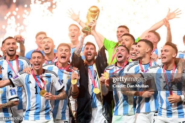 Lionel Messi of Argentina lifts the FIFA World Cup Qatar 2022 Winner's Trophy following the FIFA World Cup Qatar 2022 Final match between Argentina...