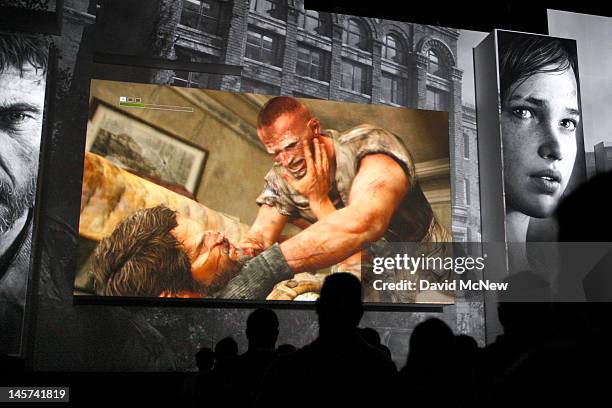 Men fight to the death in the violent PlayStation 3 game, The Last of Us, at the Sony press conference on the eve of the Electronic Entertainment...