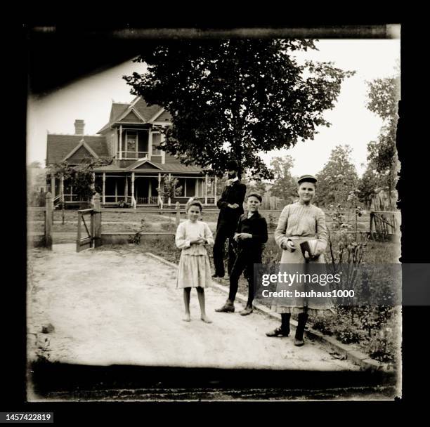 portrait of victorian-era family with dad looking angry, circa 1890 - family front porch stock illustrations