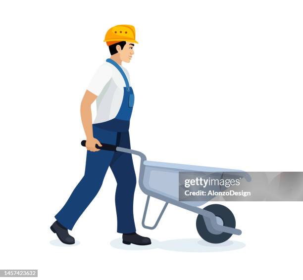 bauarbeiter arbeitet auf einer baustelle. arbeiter schiebt schubkarre. - wheelbarrow stock-grafiken, -clipart, -cartoons und -symbole