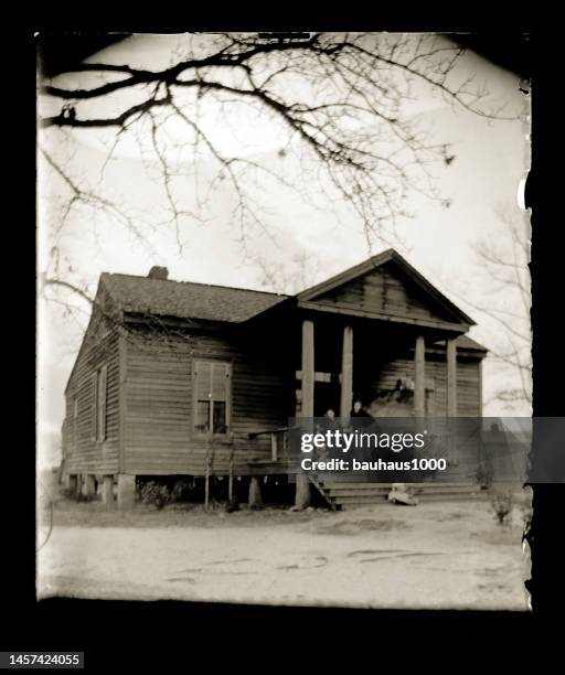 sharecroppers cottage, circa 1890 - family front porch stock illustrations