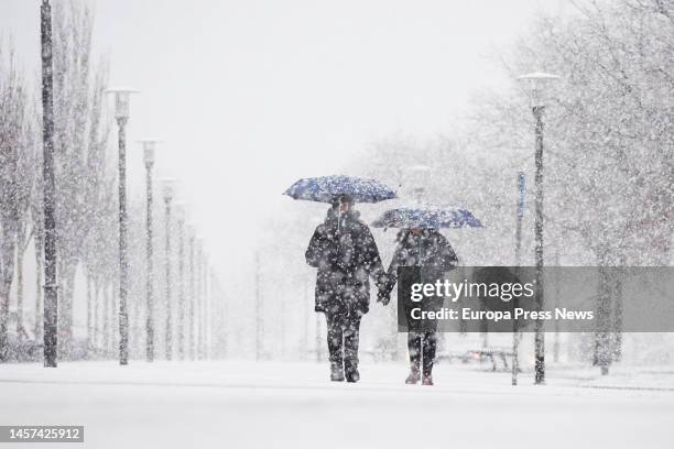 Couple walks in the snow on January 18 in Pamplona, Navarra, Spain. The strong storm associated with the storms Gerard and Fien has caused that...