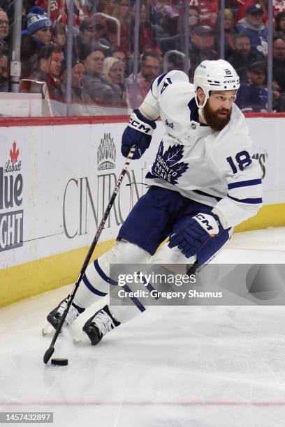 Jordie Benn of the Toronto Maple Leafs skates against the Detroit Red Wings at Little Caesars Arena on January 12, 2023 in Detroit, Michigan.