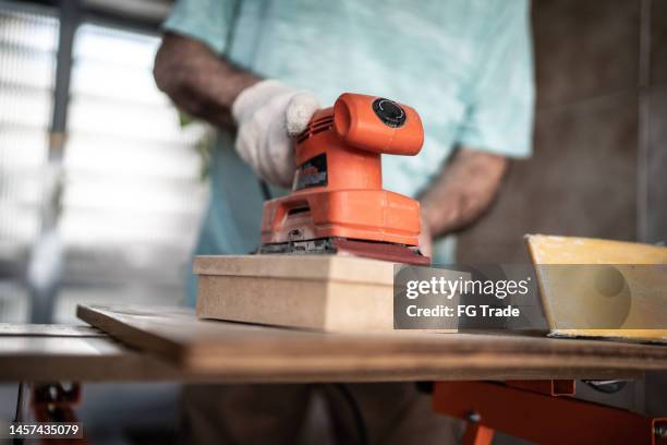 Guy Using A Sander 249 Sanders Bird Stock Photos, High-Res Pictures, and Images - Getty Images