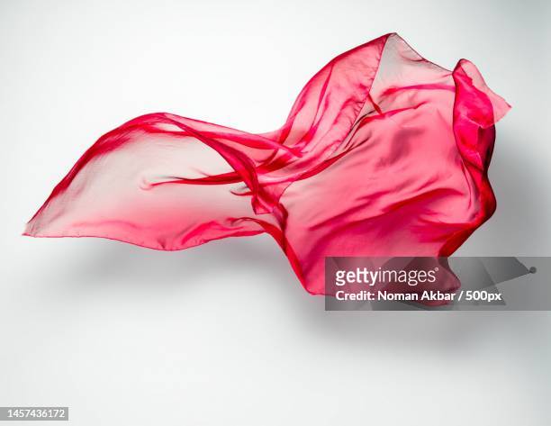 abstract flying fabric red feel real,pakistan - flowing fabric stock pictures, royalty-free photos & images