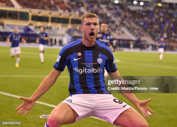 Edin Dzeko of FC Internazionale celebrates after scoring his team's second goal during the EA Sports Supercup match between AC Miland and FC...