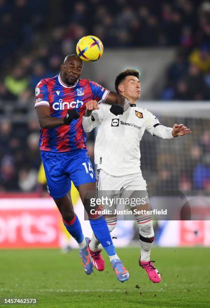 Jean-Philippe Mateta of Crystal Palace contends for the aerial ball with Lisandro Martinez of Manchester United during the Premier League match...