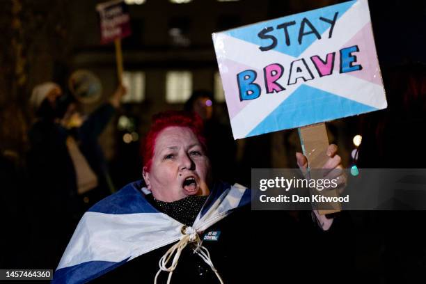 Trans rights supporters protest against the governments blocking of the Scottish parliament's Gender Recognition Reform Bill at Downing Street on...