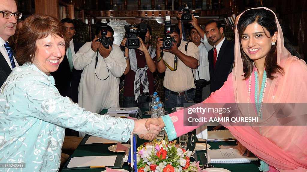 Hami Rabbani Pakistani Foreign Minister Hina Rabbani Khar shakes hands with EU ...