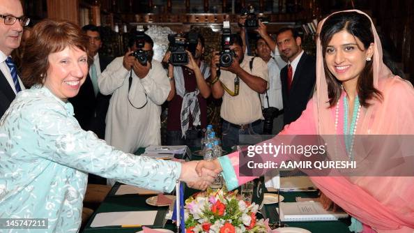 Zill Rabbani Pakistani Foreign Minister Hina Rabbani Khar shakes hands with EU ...