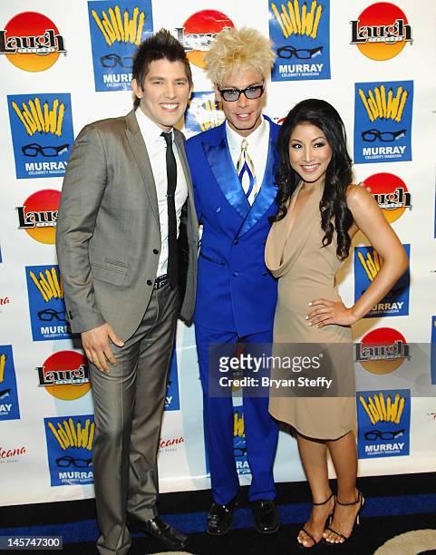 Vocalist Jasmine Trias and magician/comedian Murray Sawchuck arrive at the opening of MURRAY "Celebrity Magician" at the Laugh Factory at the...