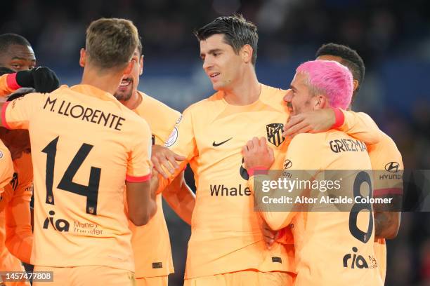 Alvaro Morata of Atletico de Madrid celebrates scoring his side's first goal with his team mates during the Copa del Rey Round of 16 match between...