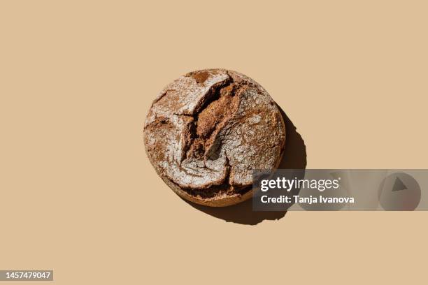 bread handmade on beige background. flat lay, top view, copy space - dark bread stock pictures, royalty-free photos & images