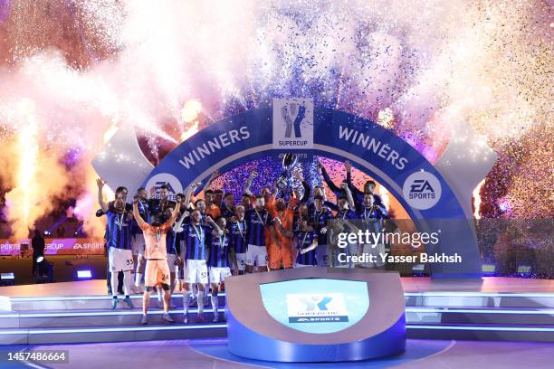 Samir Handanovic of FC Internazionale lifts the EA Sports Supercup as players of FC Internazionale celebrate after the EA Sports Supercup match...