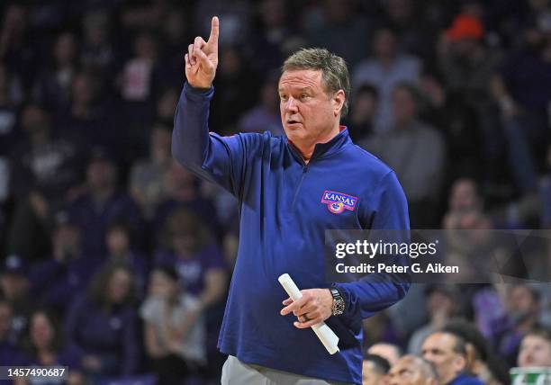 Head coach Bill Self of the Kansas Jayhawks instructs his players on the court in overtime against the Kansas State Wildcats at Bramlage Coliseum on...