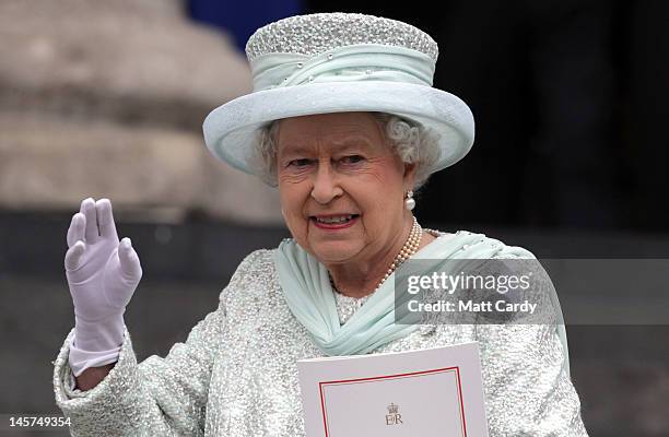 Queen Elizabeth II waves as she leaves a Service Of Thanksgiving at St Paul's Cathedral on June 5, 2012 in London, England. For only the second time...