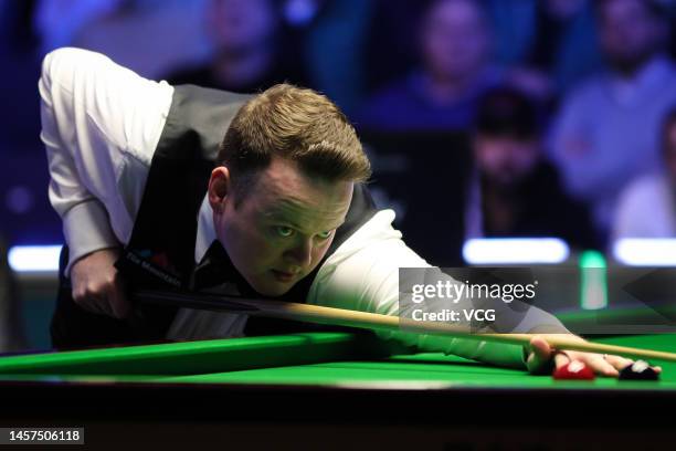 Shaun Murphy of England plays a shot during the first round match against Ali Carter of England on day three of the 2023 Duelbits World Grand Prix at...