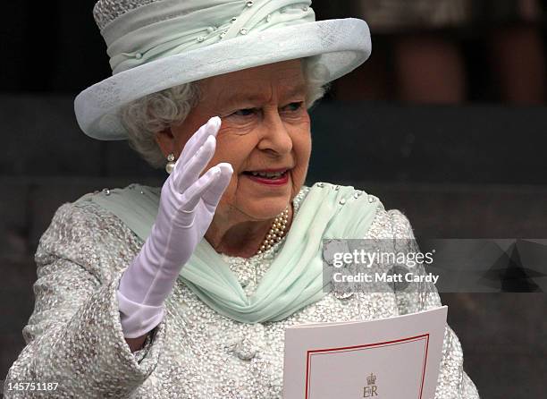 Queen Elizabeth II waves as she leaves a Service Of Thanksgiving at St Paul's Cathedral on June 5, 2012 in London, England. For only the second time...