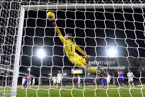 David De Gea of Manchester United fails to make a save as Michael Olise of Crystal Palace scores the team's first goal during the Premier League...