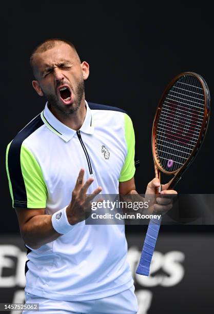 Daniel Evans of Great Britain reacts in their round two singles match against Jeremy Chardy of France during day four of the 2023 Australian Open at...