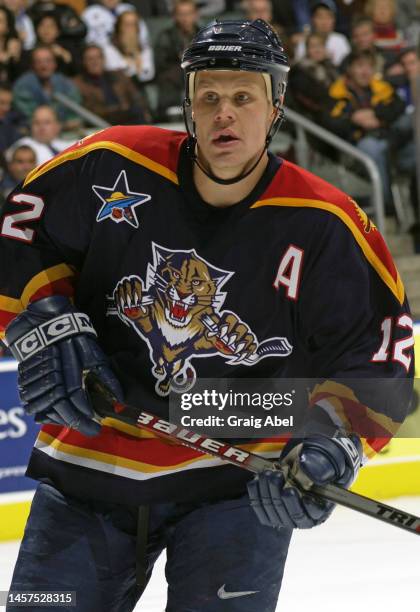 Olli Jokinen of the Florida Panthers skates against the Toronto Maple Leafs during NHL game action on October 23, 2002 at Air Canada Centre in...